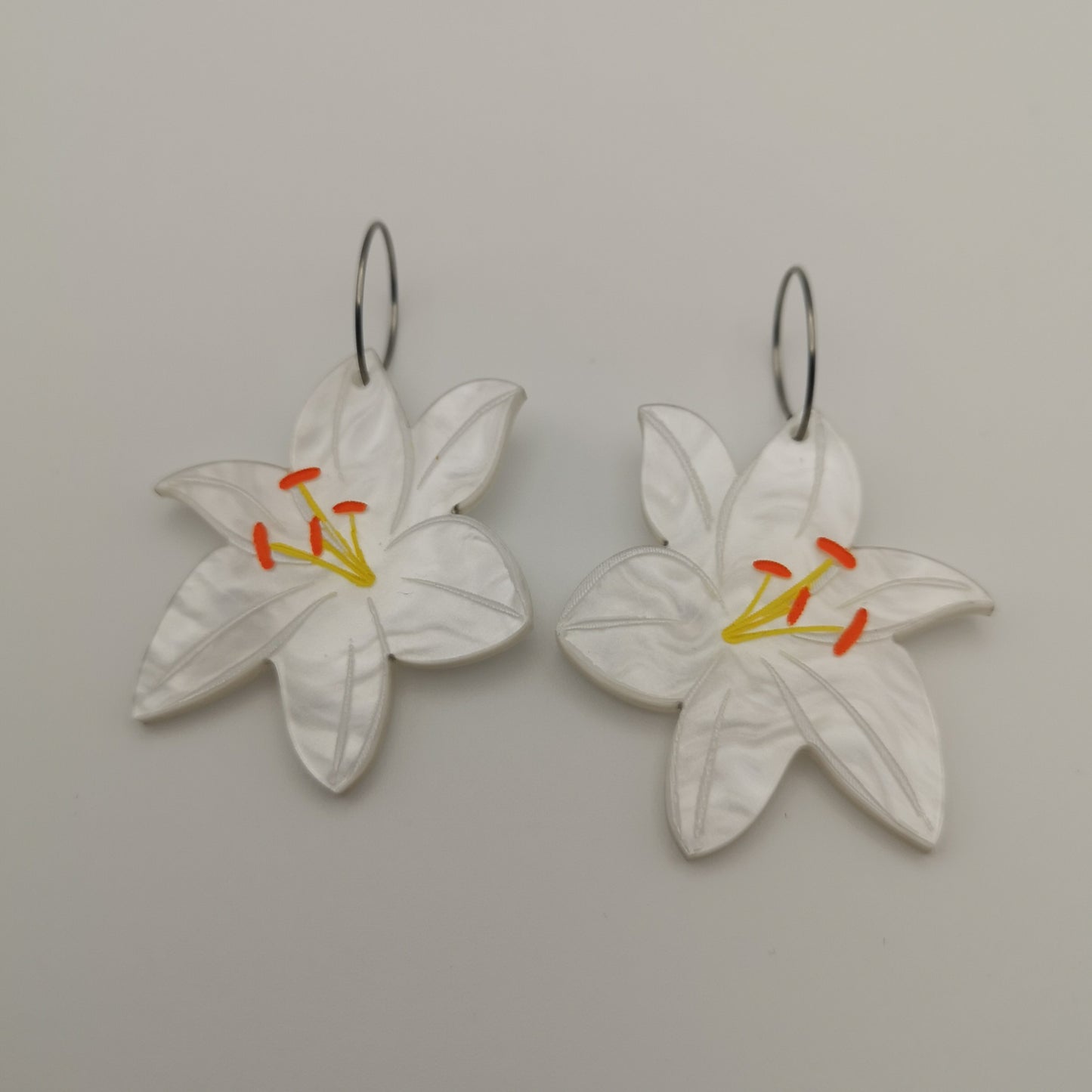 earrings statement bold light-wear comfortable hypoallergenic stainless steel lily flower marbled white hoop