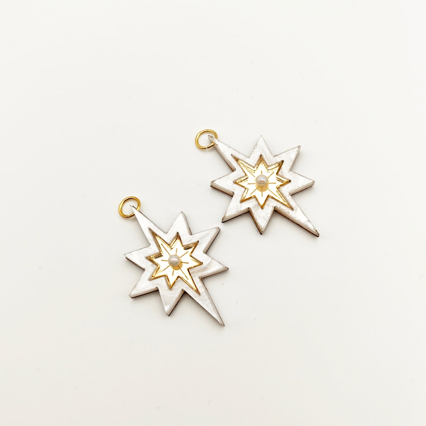 Long star shaped charms gold marble white hoops only charm