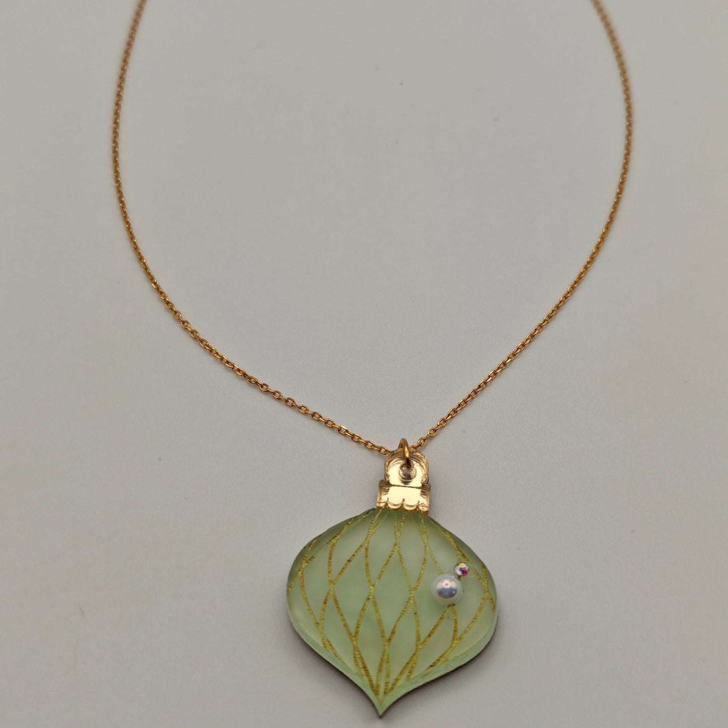 Golden swirl onion necklace